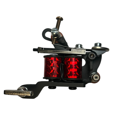 Hatchback Sledge tattoo machine with red coils and liner speed bar for large needle groupings
