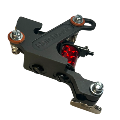 Hatchback Sledge tattoo machine with red coils and liner speed bar for large needle groupings