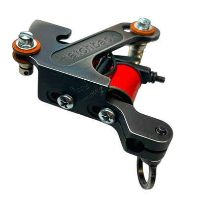 Hatchback traditional coil tattoo machine with red wrap coils and steel frame